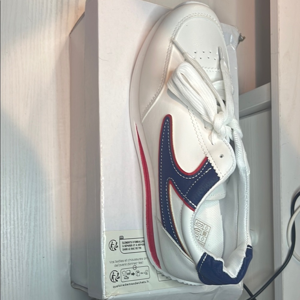 White and Blue Athletic Sneakers